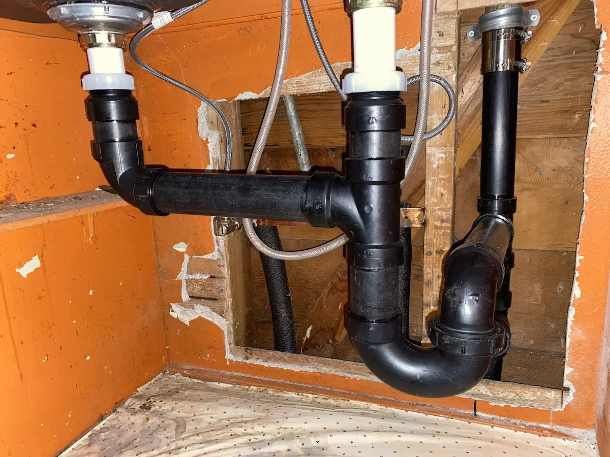 Professional Garbage Disposal Repair equipment and tools on the job in Collierville